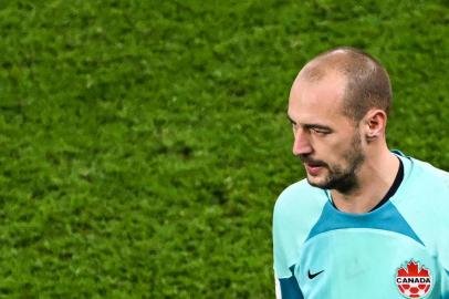 Canadas goalkeeper #18 Milan Borjan reacts during the Qatar 2022 World Cup Group F football match between Belgium and Canada at the Ahmad Bin Ali Stadium in Al-Rayyan, west of Doha on November 23, 2022. (Photo by Patrick T. FALLON / AFP)<!-- NICAID(15280078) -->