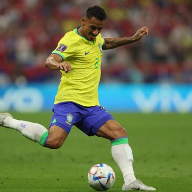 Brazils defender #02 Danilo kicks the ball during the Qatar 2022 World Cup Group G football match between Brazil and Serbia at the Lusail Stadium in Lusail, north of Doha on November 24, 2022. (Photo by Adrian DENNIS / AFP)<!-- NICAID(15281329) -->