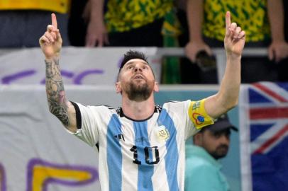 Argentinas forward #10 Lionel Messi celebrates after he scored his teams first goal during the Qatar 2022 World Cup round of 16 football match between Argentina and Australia at the Ahmad Bin Ali Stadium in Al-Rayyan, west of Doha on December 3, 2022. (Photo by JUAN MABROMATA / AFP)Editoria: SPOLocal: DohaIndexador: JUAN MABROMATASecao: soccerFonte: AFPFotógrafo: STF<!-- NICAID(15284889) -->