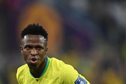 Brazils forward #20 Vinicius Junior celebrates scoring his teams first goal during the Qatar 2022 World Cup round of 16 football match between Brazil and South Korea at Stadium 974 in Doha on December 5, 2022. (Photo by MANAN VATSYAYANA / AFP)Editoria: SPOLocal: DohaIndexador: MANAN VATSYAYANASecao: soccerFonte: AFPFotógrafo: STF<!-- NICAID(15286235) -->