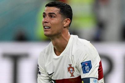 Portugals forward #07 Cristiano Ronaldo reacts during the Qatar 2022 World Cup quarter-final football match between Morocco and Portugal at the Al-Thumama Stadium in Doha on December 10, 2022. (Photo by PATRICIA DE MELO MOREIRA / AFP)Editoria: SPOLocal: DohaIndexador: PATRICIA DE MELO MOREIRASecao: soccerFonte: AFPFotógrafo: STR<!-- NICAID(15292063) -->