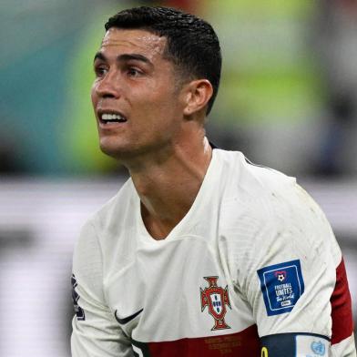 Portugals forward #07 Cristiano Ronaldo reacts during the Qatar 2022 World Cup quarter-final football match between Morocco and Portugal at the Al-Thumama Stadium in Doha on December 10, 2022. (Photo by PATRICIA DE MELO MOREIRA / AFP)Editoria: SPOLocal: DohaIndexador: PATRICIA DE MELO MOREIRASecao: soccerFonte: AFPFotógrafo: STR<!-- NICAID(15292063) -->