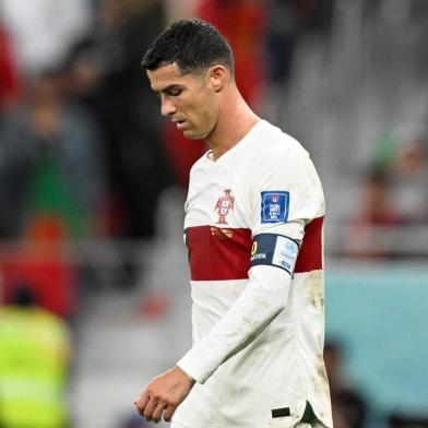 Portugals forward #07 Cristiano Ronaldo reacts after losing  the Qatar 2022 World Cup quarter-final football match between Morocco and Portugal at the Al-Thumama Stadium in Doha on December 10, 2022. (Photo by PATRICIA DE MELO MOREIRA / AFP)<!-- NICAID(15292084) -->