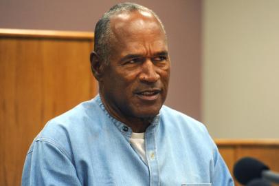 O.J. Simpson looks on during his parole hearing at the Lovelock Correctional Center in Lovelock, Nevada on July 20, 2017.Disgraced former American football star O.J. Simpson was granted his release from prison  after serving nearly nine years behind bars for armed robbery. A four-member parole board in the western US state of Nevada voted unanimously to free the 70-year-old Simpson after a public hearing broadcast live by US television networks. / AFP PHOTO / POOL / Jason Bean / RESTRICTED TO EDITORIAL USE - MANDATORY CREDIT AFP PHOTO /POOL/Reno Gazette-Journal/ Jason Bean - NO MARKETING NO ADVERTISING CAMPAIGNS - DISTRIBUTED AS A SERVICE TO CLIENTS<!-- NICAID(13042846) -->