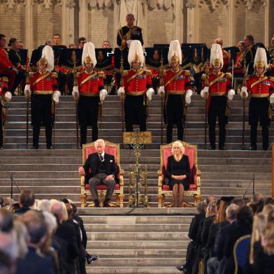 (FILES) In this file photo taken on September 12, 2022 Britains King Charles III and Britains Camilla, Queen Consort attend the presentation of Addresses by both Houses of Parliament in Westminster Hall, inside the Palace of Westminster, central London, following the death of Queen Elizabeth II on September 8. - The coronation weekend for King Charles III, that will take place on May 6, 2023, will feature a star-studded concert, nationwide big lunch and volunteering initiative as well as the traditional ceremony and royal processions, Buckingham Palace announced late on January 21, 2022. (Photo by Ian Vogler / POOL / AFP)<!-- NICAID(15328193) -->