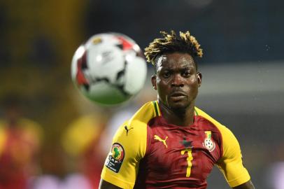 (FILES) In this file photo taken on June 26, 2019 Ghanas midfielder Christian Atsu chases down the ball during the 2019 Africa Cup of Nations (CAN) football match between Ghana and Benin at the Ismailia Stadium. - Ghana national player and former Newcastle midfielder Christian Atsu has been found alive in the rubble of an earthquake that killed more than 4,800 people in Turkey and neighbouring Syria, Ghanas ambassador to Turkey said February 7, 2023. (Photo by OZAN KOSE / AFP)<!-- NICAID(15342179) -->