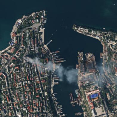 This handout satellite image released on September 23, 2023 by Planet Labs PBC shows an aerial view of the city of Sevastopol after a missile attack struck the headquarters of Moscows Black Sea fleet in annexed Crimea on September 22, 2023, sparking a huge fire and leaving at least one Russian serviceman missing. The strike on the symbolic heart of Russias Black Sea fleet marks a major blow for Moscow, which has suffered a string of attacks on the strategically important port in recent months. (Photo by Handout / Planet Labs PBC / AFP) / RESTRICTED TO EDITORIAL USE - MANDATORY CREDIT AFP PHOTO / PLANET LABS PBC - NO MARKETING - NO ADVERTISING CAMPAIGNS - DISTRIBUTED AS A SERVICE TO CLIENTSRESTRICTED TO EDITORIAL USE - MANDATORY CREDIT AFP PHOTO / PLANET LABS PBC - NO MARKETING - NO ADVERTISING CAMPAIGNS - DISTRIBUTED AS A SERVICE TO CLIENTS / <!-- NICAID(15549354) -->